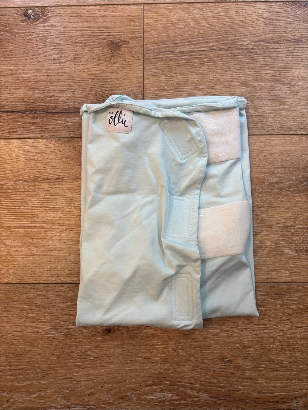 The Ollie Baby swaddle - light blue